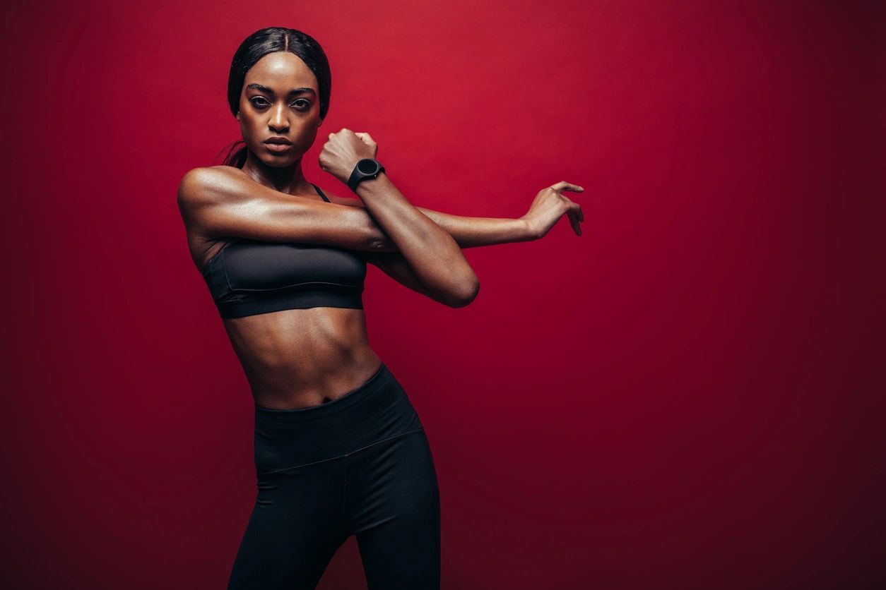 Health and fitness, woman stretching before exercise